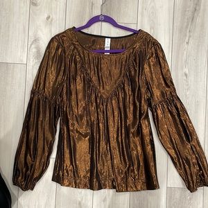 Amadi  Anthropologie shimmery copper blouse.